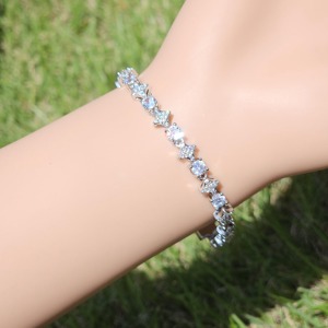 Pulsera de tenis de lujo de plata 925 con diamantes VVS, colección de cadenas con eslabones de cruz y trébol, joya llamativa para streetwear - Product Image 1