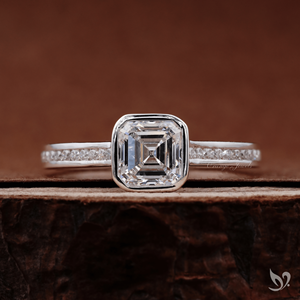 Anillo de compromiso vintage elegante de oro blanco de 10k con diamante de laboratorio de 1 quilate con corte Asscher engastado en bisel y banda de canal. - Product Image 1