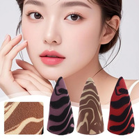 Éponge cosmétique JLY OEM personnalisée, design marbré, matière douce et respectueuse de la peau, facile à nettoyer et réutilisable pour le maquillage quotidien