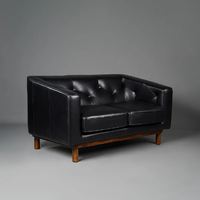 Canapé Chesterfield de luxe à une place en cuir véritable, fauteuil capitonné avec accoudoirs roulés, structure en bois massif, salon classique rectangulaire