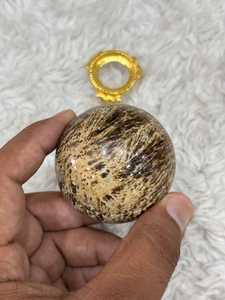 Banded aragonite <b>sphere</b> with layered mineral patterns earthy tones polished round form natural texture and distinctive - Product Image 3