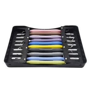 Juego de 10 instrumentos manuales para restauración dental con mango de plástico, curetas de colores, kit de scaler, certificado CE, Clase - Product Image 1