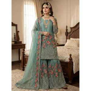 Presentando la Nueva Colección Eid: Conjunto de Seda con Bordado y Lentejuelas, Completamente Cosido, Listo para Usar, Estilo Moderno para Fiestas - Product Image 1