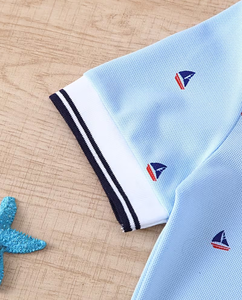 Light Blue Printed Short Sleeve Polo Shirt with Navy Trim for Kids Casual Eco-Friendly Breathable School Uniform Look - Product Image 4