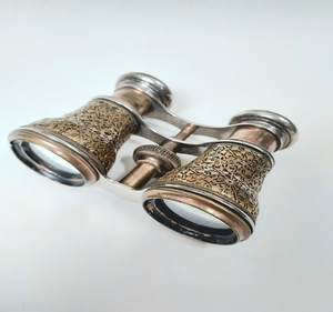 Intricately carved vintage brass opera glasses with ornate detailed barrels, available at wholesale prices. - Product Image 1