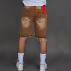 Pantalones cortos de mezclilla marrón de alta calidad con paneles dobles de rodilla personalizados con múltiples pedrerías, pedrería grande y cortes clásicos, lavado vintage y peso pesado. - Product Image 4