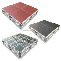 Plateforme de scène portable en aluminium moderne pour mariages, concerts et événements, facile à ranger
