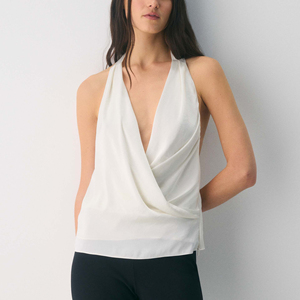 Blouse d'été tendance pour femme, sans manches, col halter, unie, avec logo frontal, 100% polyester écologique, vente en gros - Product Image 1