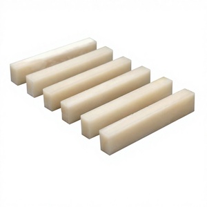 Nut de guitare en os de buffle de qualité supérieure, blanchi et non blanchi, pour améliorer le son et l'action des instruments, à prix abordables. - Product Image 1
