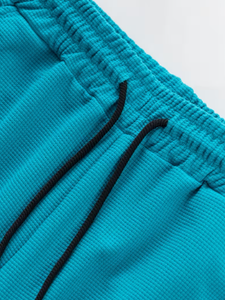 Pantalon de survêtement large pour homme, couleur turquoise, taille élastique avec cordon de serrage, coupe décontractée - Product Image 2