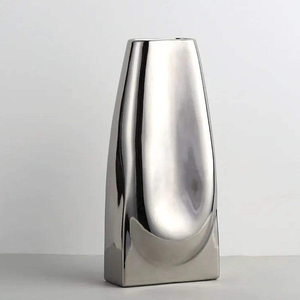 Vase à fleurs en métal de forme ronde avec un design élégant, parfait pour la décoration de table - Product Image 5