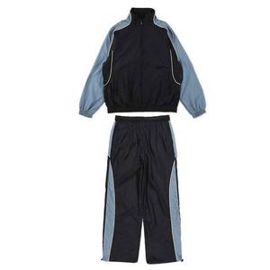 Ensemble de survêtement décontracté imprimé de qualité supérieure : Veste coupe-vent en nylon et pantalon de jogging avec sweat à capuche sportif - Product Image 1