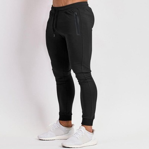 Pantalon de jogging taille US, logo personnalisé, en polyester, pour fitness, course à pied, sport, coupe ajustée, avec cordon de serrage central - Product Image 4