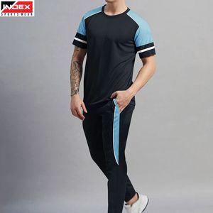 Conjunto deportivo ligero de camiseta y pantalón para hombre, ropa deportiva de verano para gimnasio, conjunto elegante e informal. - Product Image 1