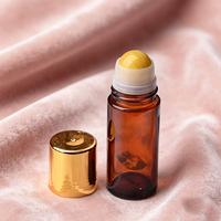 Flacon roll-on en verre épais rechargeable de 30 ml/50 ml avec bouchon à vis, rouleau en pierre, estampage à chaud doré et sérigraphie pour huiles essentielles et soins de la peau