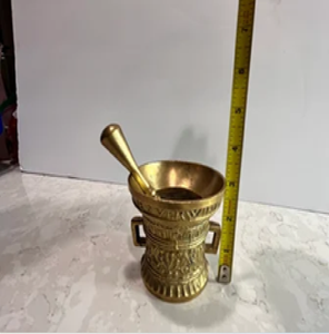 Detailed lion face relief vintage brass mortar and pestle set for home display, available at wholesale prices. - Product Image 2