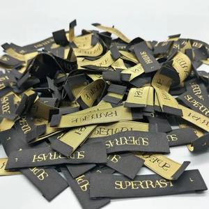 Étiquettes tissées pour vêtements, personnalisées avec logo et taille, pliées sur le côté, haute densité, qualité supérieure - Product Image 4