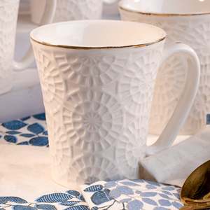 Embossed Pure White Ceramic Tea Cups Set of 2 - Product Image 2