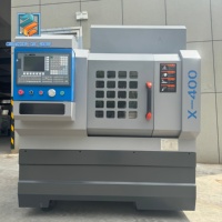 Tour CNC Fanuc à lit plat horizontal monophasé 380V X400 personnalisable de haute précision pour jantes en alliage