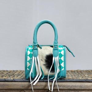 Bolso Speedy de lujo color verde azulado con panel de piel sintética y detalles de borlas, diseño con patrón geométrico - Product Image 1