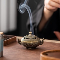 Brûleur d'encens écologique en fer avec découpes florales et poignée en bois, diffuseur d'encens aromatique indien pour une utilisation toute l'année