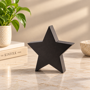 Urne commémorative Astral en métal noir robuste avec silhouette d'étoile, pour cendres funéraires, hommage aux animaux de compagnie et présentation à domicile - Product Image 1