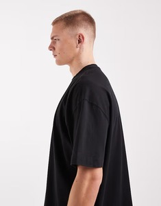 Camiseta de algodón negra de manga corta con cuello redondo para hombre, corte holgado, informal, de color liso, tejido de punto tipo jersey. - Product Image 2