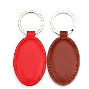 Porte-clés ovale en cuir durable avec plaque métallique ronde et anneau porte-clés - Product Image 5