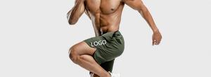 Shorts de sport pour homme, noirs unis, à séchage rapide, avec poches, taille élastique, longueur mi-cuisse, logo sur le devant - Product Image 3