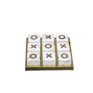 Luxueux jeu de Tic-Tac-Toe en marbre avec bande de métal doré au toucher marbre avec XO en marbre pour décoration intérieure et jeux d'enfants - Product Image 1