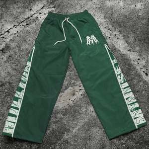 กางเกงวอร์มทรงหลวมของผู้ชายกางเกงไนลอนโพลีเอสเตอร์บล็อกสีกระเป๋าด้านหน้ายุทธวิธีแห้งเร็วยืดหยุ่นน้ำหนักเบา - Product Image 4