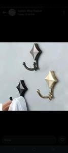 Wall mounted <b>hooks</b> provide elegant solution for organizing coats <b>towels</b> accessories efficiently in home spaces - Product Image 3