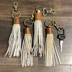 พวงกุญแจหนังแท้ทำมือ ขนสัตว์แท้ รูปทรงพู่ห้อยน่ารักมีเสน่ห์ สไตล์ตะวันตก ทันสมัย - Product Image 6