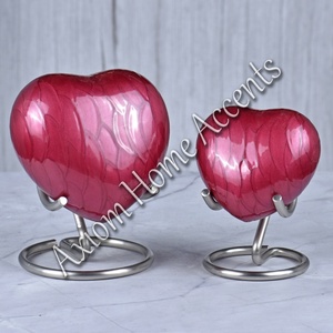 Elegant Pet Memorial Urn With Paw Print <b>Design</b> and Polished Surface for a Dignified Tribute <b>by</b> Axiom Home Accents - Product Image 1