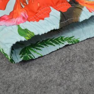Pantalones cortos de playa informales para hombre superventas al por mayor secado rápido ajustados transpirables de alta calidad con estampado floral traje de baño sublimado - Product Image 3