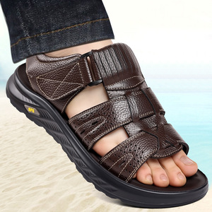 รองเท้าแตะหนังแท้ผู้ชายรุ่นใหม่ปี 2026 แฟชั่นสำหรับกิจกรรมกลางแจ้ง ขับรถ ชายหาด พื้นนุ่ม สวมใส่สบาย - Product Image 1
