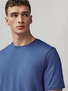 เสื้อยืดคอกลมทรงหลวมสำหรับผู้ชาย ผ้าฝ้าย 100% แห้งเร็ว สไตล์ลำลอง สำหรับเล่นกีฬา  สามารถปรับแต่งแบรนด์และโลโก้ด้านหน้าได้ - Product Image 4