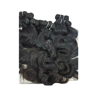 Qualité assurée 100% vierges indiens Remy extensions de cheveux lisses et doux cheveux humains bruts dans un style ondulé naturel - Product Image 1