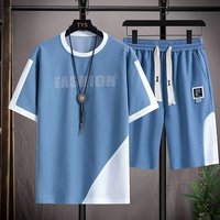 Ensemble de sport décontracté pour homme en polyester gaufré respirant, imprimé OEM, grande taille, col ample, t-shirt à manches courtes et short, idéal pour l'été