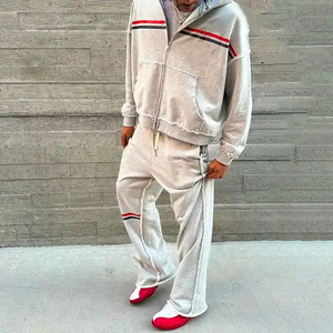 ชุดวอร์มทรงโอเวอร์ไซส์พรีเมียมลายกราฟิกสุดเท่ เสื้อสเวตเชิ้ตโอเวอร์ไซส์ใส่สบายและกางเกงขาบาน เหมาะสำหรับสตรีทแวร์ - Product Image 1