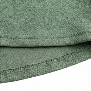 Jupe courte trapèze pour femme, couleur unie, taille élastique, logo en relief, tissu tricoté respirant, style sportif, toutes saisons - Product Image 3