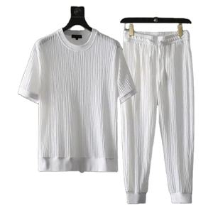 2024 nueva camiseta minimalista de verano de Color sólido para hombre plisada elástica transpirable de manga corta fina suelta hasta el tobillo conjuntos de pantalones - Product Image 5