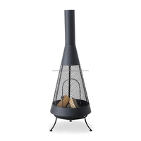 Table de foyer extérieur de style campagnard avec structure en fer épaisse et espace de combustion rond, conçue pour une utilisation sûre de la flamme nocturne, écologique