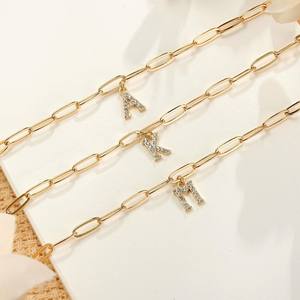 Pulsera de Cadena Estilo Tenis AMBER JEWELS T-2490 Chapada en Oro de 10K con Dije de Letra S de Cristal, Diseño Minimalista, Unisex, para Uso Diario - Product Image 3
