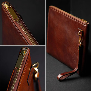Bolso de mano de cuero genuino con cierre de cremallera premium y múltiples compartimentos para tarjetas, efectivo y teléfono móvil en venta. - Product Image 6