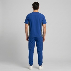 Traje quirúrgico premium hecho de tela suave y transpirable para mayor comodidad durante todo el día en hospitales, clínicas, laboratorios y entornos sanitarios. - Product Image 2