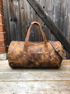 กระเป๋าเดินทางหนังวัวแท้สไตล์เรโทร ขนาด 36-55 ลิตร น้ำหนักเบา พกพาสะดวก สำหรับเดินทางท่องเที่ยวหรือธุรกิจ รุ่น LDB-0254 เหมาะสำหรับทั้งชายและหญิง - Product Image 3