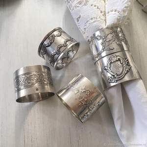 Anneau de serviette en métal décoratif, ajoutant une touche artistique aux arrangements de table, avec une qualité et une finition durables. - Product Image 2