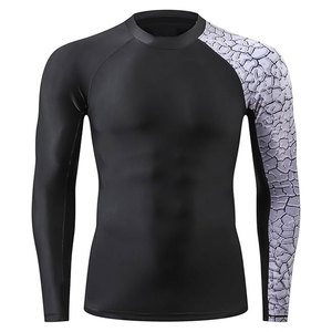 เสื้อแรชการ์ดผู้ชายสำหรับออกกำลังกาย ระบายอากาศได้ดี น้ำหนักเบา คุณภาพเยี่ยมจากผู้ผลิตชั้นนำ ขายดีที่สุด ทรงเข้ารูป สวมใส่สบาย เหมาะสำหรับการเล่นกีฬาในยิม - Product Image 1