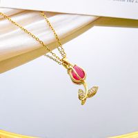 Collier minimaliste en acier titane avec pendentif fleur pour femme – Idéal pour les soirées romantiques, les vacances et les cadeaux tendance
